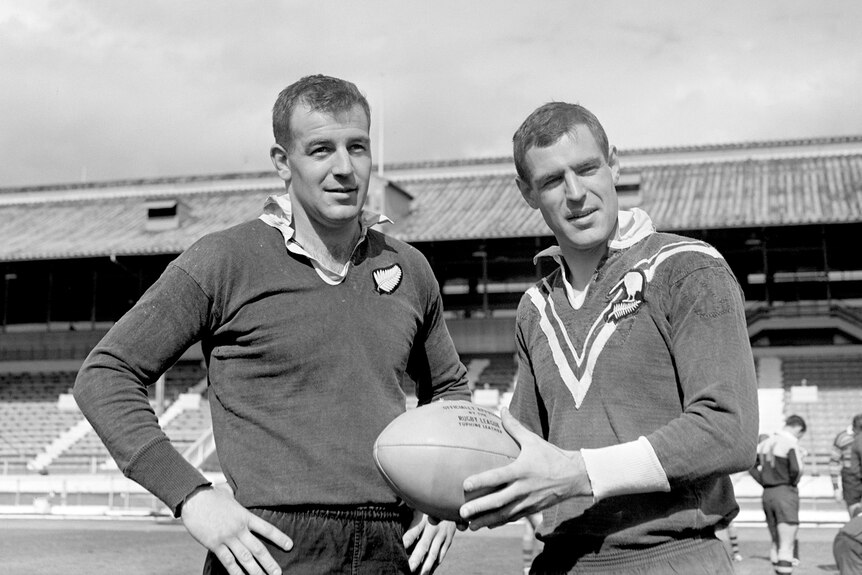 Two men pose during a rugby league training session