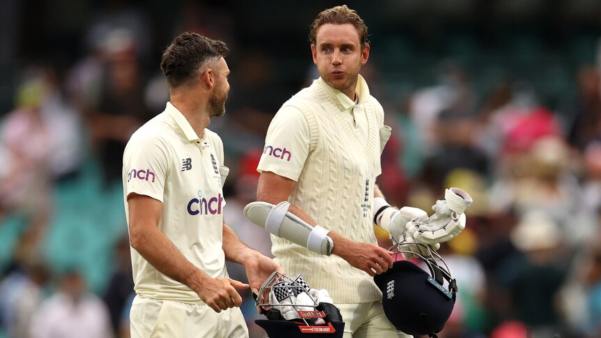 England batters Stuart Broad and James Anderson walk off the SCG after a draw in the fourth Ashes Test against Australia.