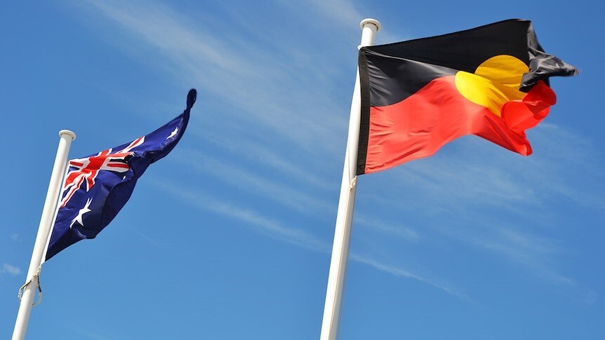 Australian and Aboriginal flag flying side by side
