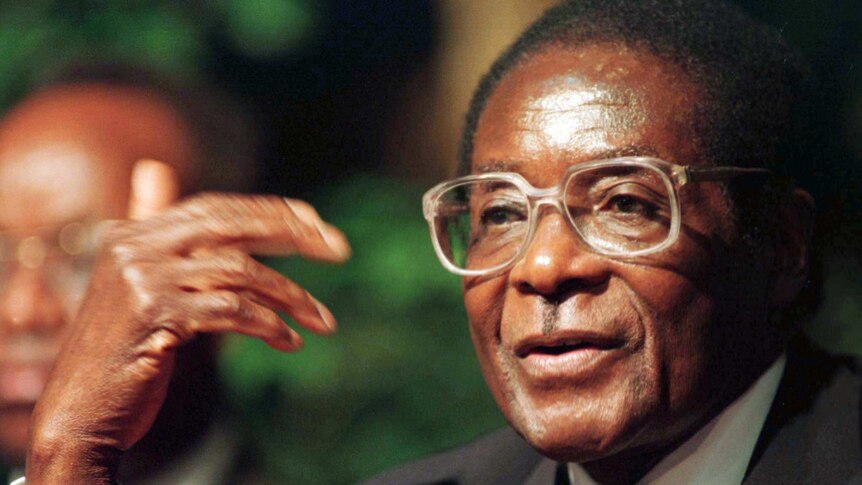 Zimbabwe President Robert Mugabe addresses a news conference in Durban in 1998.