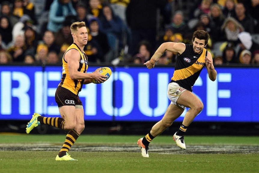 Sam Mitchell and Trent Cotchin