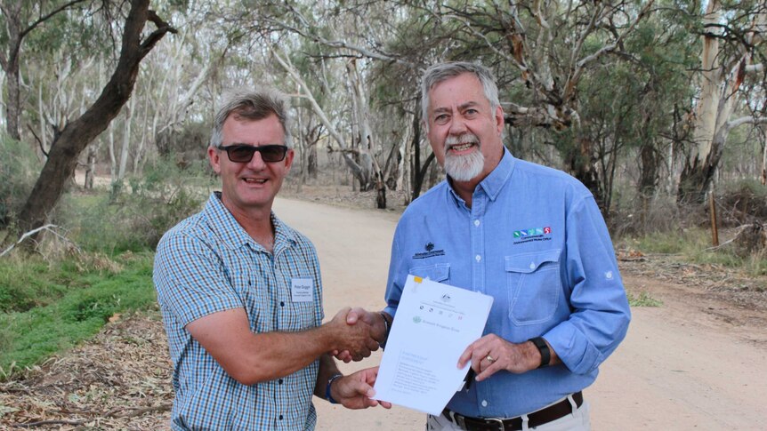 Renmark Irrigation Trust chairman Peter Duggin with the Commonwealth Water Holder David Papps.