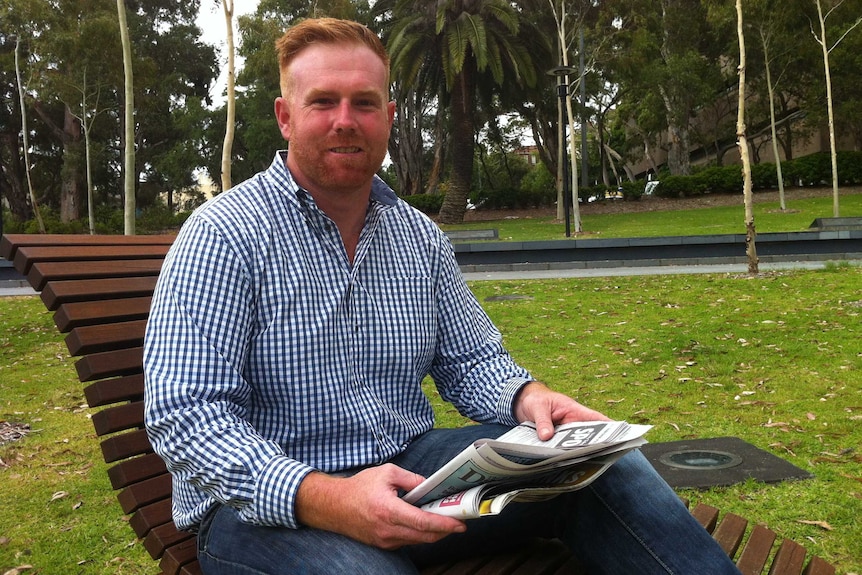 Former problem gambler Anthony O'Sullivan on a park bench.
