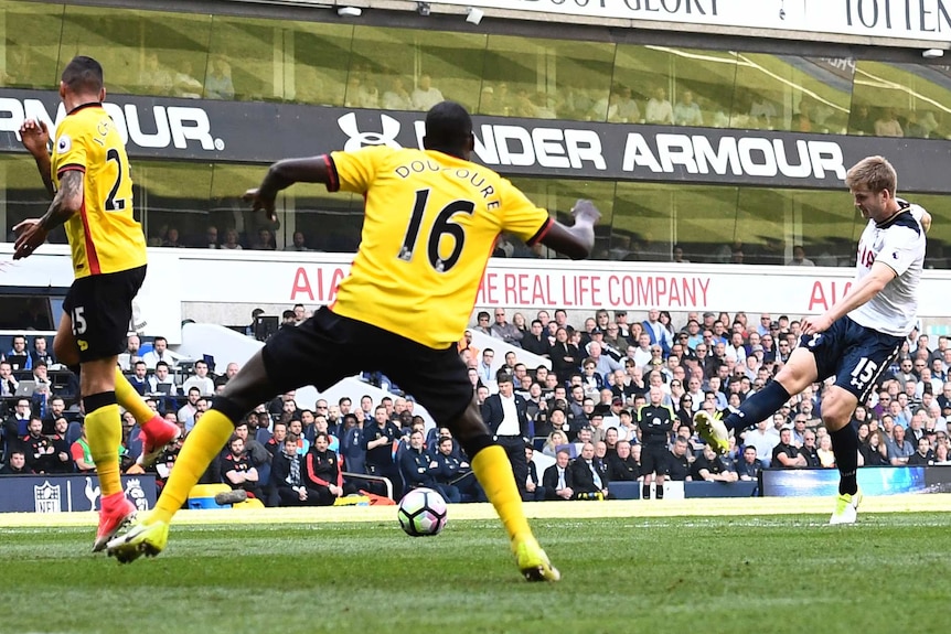 Tottenham's Eric Dier (R) scores his side's second goal against Watford on April 8, 2017.