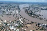An aerial view of a flooded regional city.
