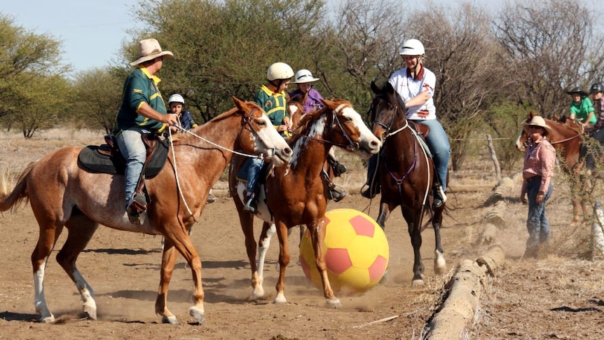 Riders take part in a horse soccer match at Hughenden.