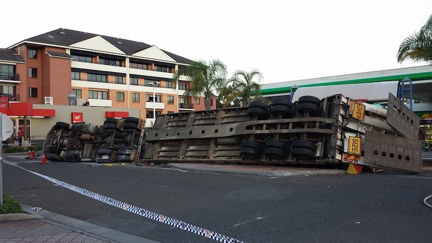 A truck which ploughed through traffic on the Princes Highway at Wollongong, coming to rest next to a service station and a McDonalds restaurant.