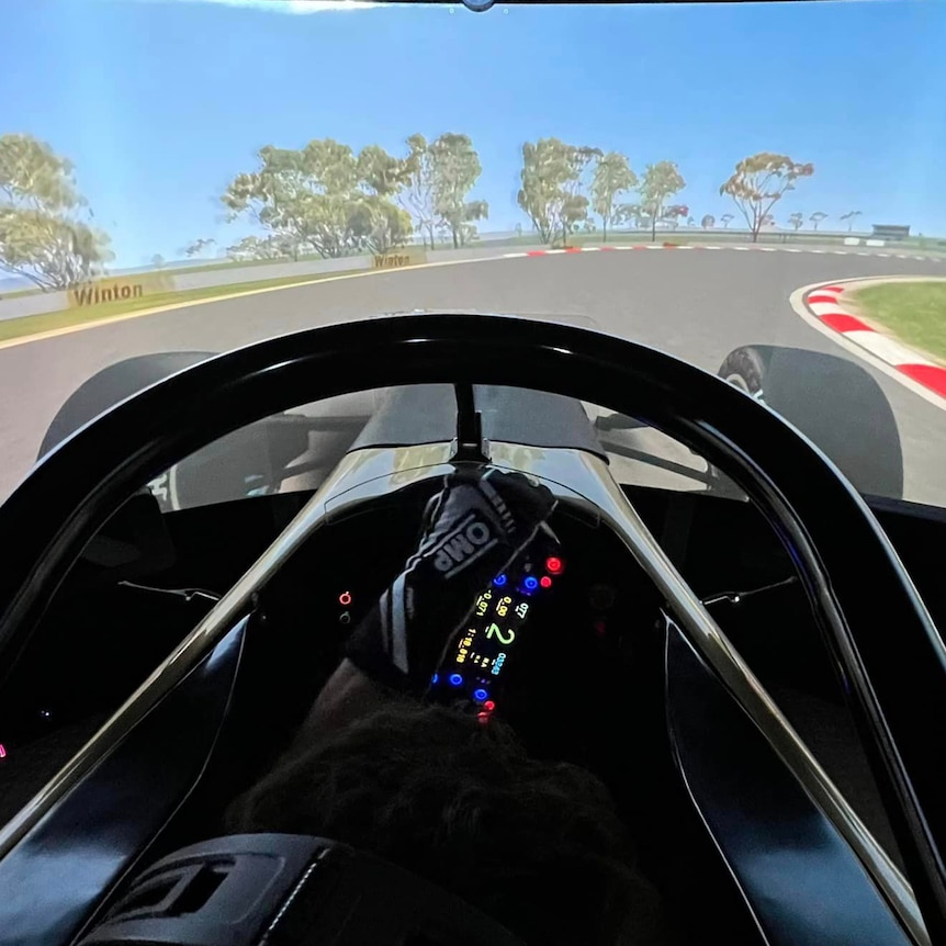 Black steering wheel in racing car
