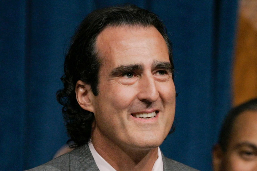 A headshot of Nobel Prize-winning scientist Craig Mello on stage.