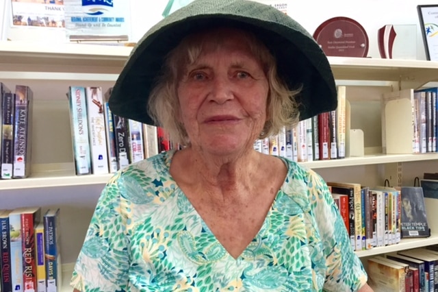 88-year-old Vida Beauchamp standing in the Boulia (in western Queensland) library.