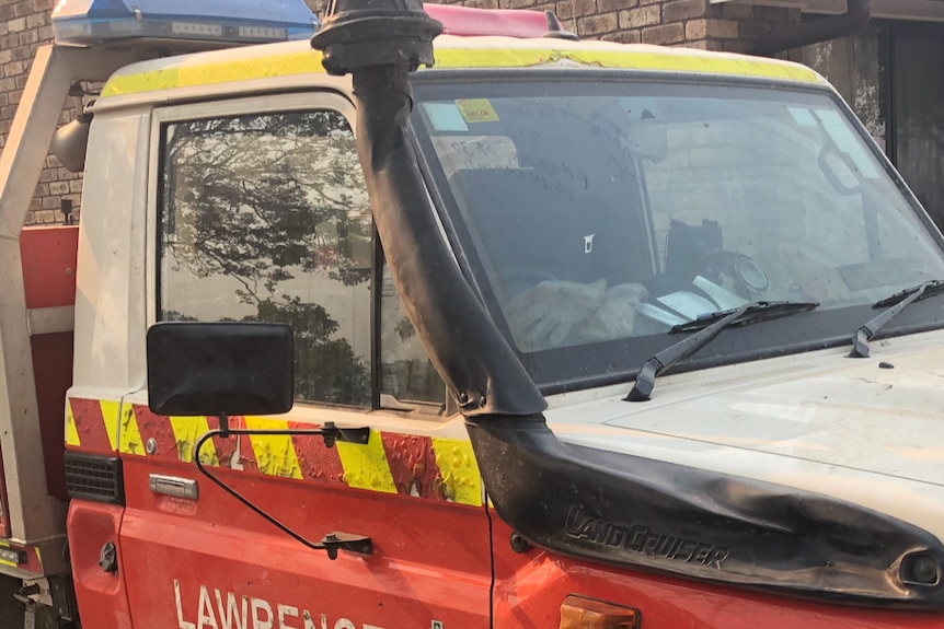 Plastic parts of the RFS Landcruiser melt under the intensity of the heat during the bushfire