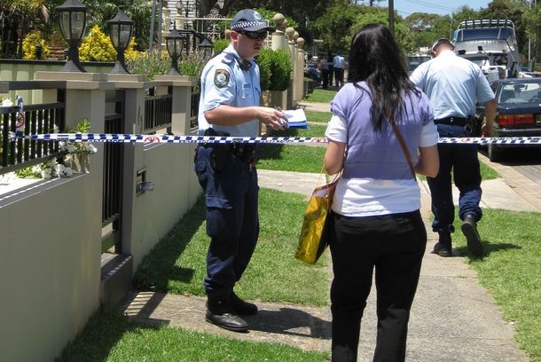 Police cordon off a house where a man was shot by police in south-west Sydney on November 18, 2009.