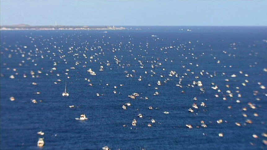 Boats and swimmers in 2013 Rottnest Swim