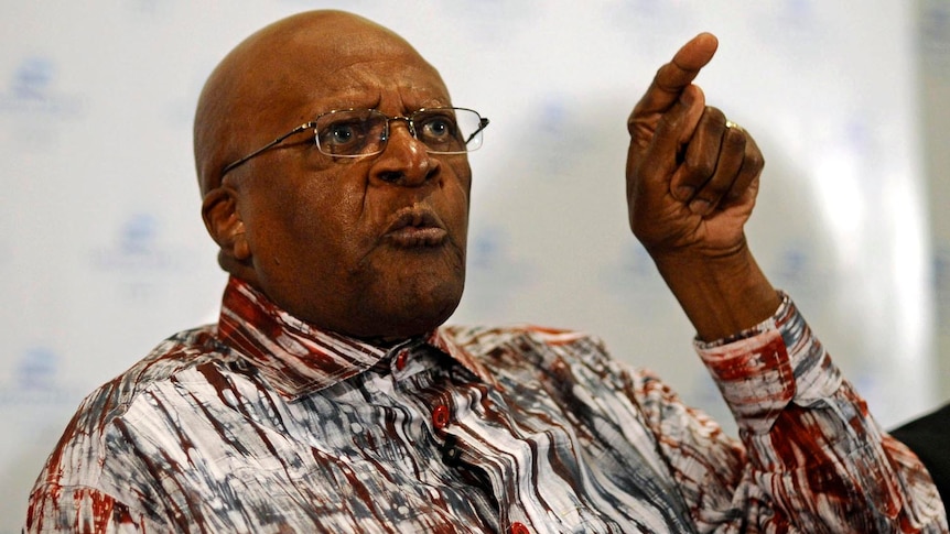 Archbishop Desmond Tutu speaks at a media conference after the Dalai Lama announced that he will not travel to South Africa.