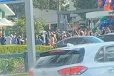 People queue for doughnuts