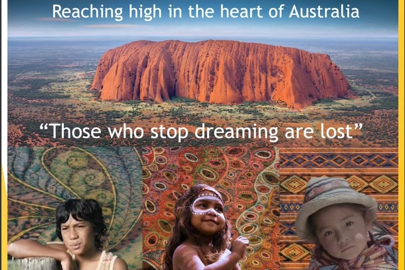 Picture of Uluru, with three kids and a message: "Reaching high in the heart of Australia, those who stop dreaming are lost."