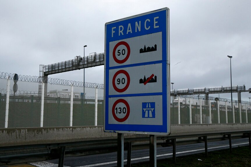 A board showing the French speed limits is set on the Eurotunnel site, meters before the tunnel linking France to Britain.