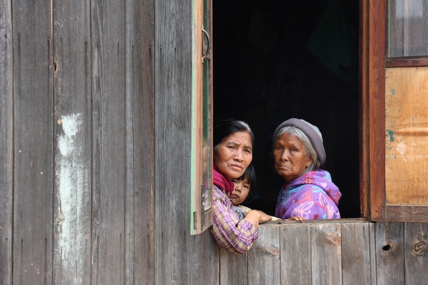 Women at a window.