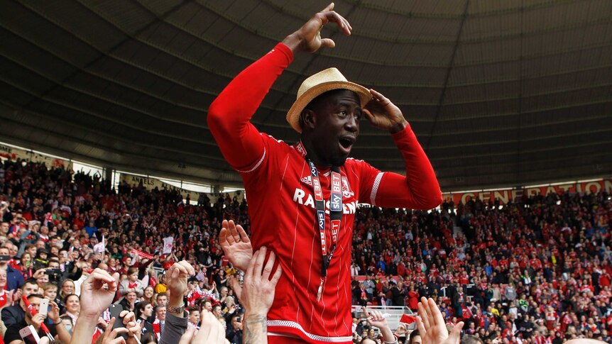 Middlesbrough's Albert Adomah celebrates with fans