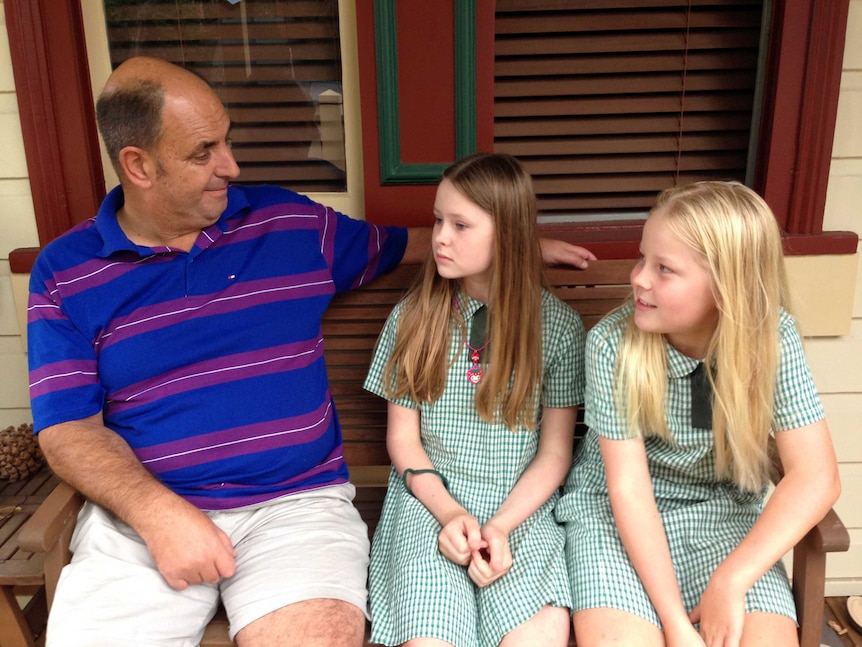 Parramatta resident Brett Evans with neighbours Evelyn and Abigail Lillie