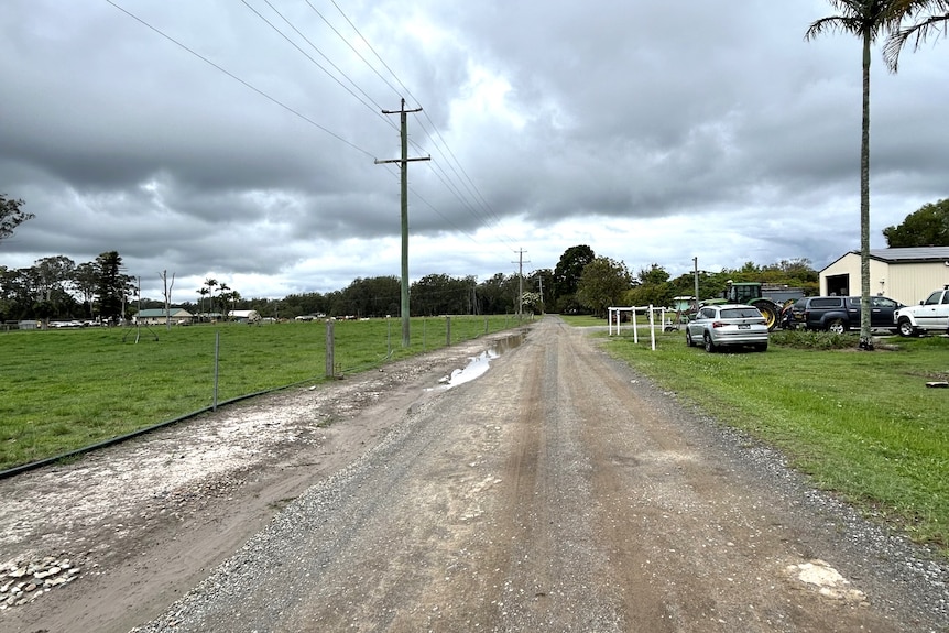 An empty dirt road.