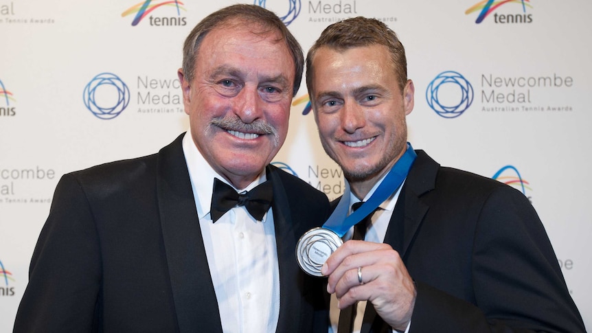 Lleyton Hewitt with John Newcombe after winning the 2013 John Newcombe Medal