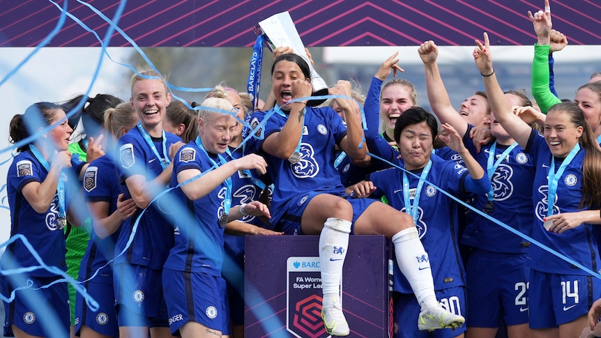 Sam Kerr celebrates with Chelsea teammates