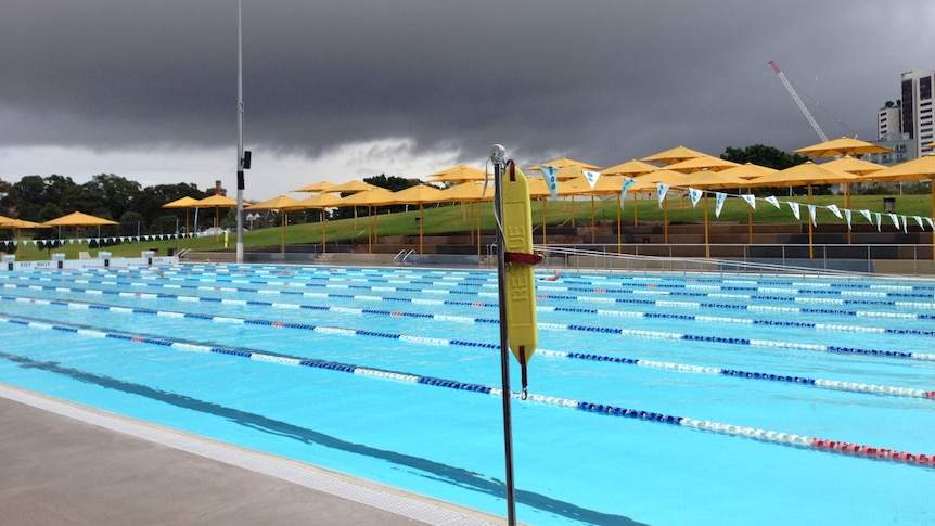 Dark thunderclouds over Prince Alfred Park swimming pool, Sydney