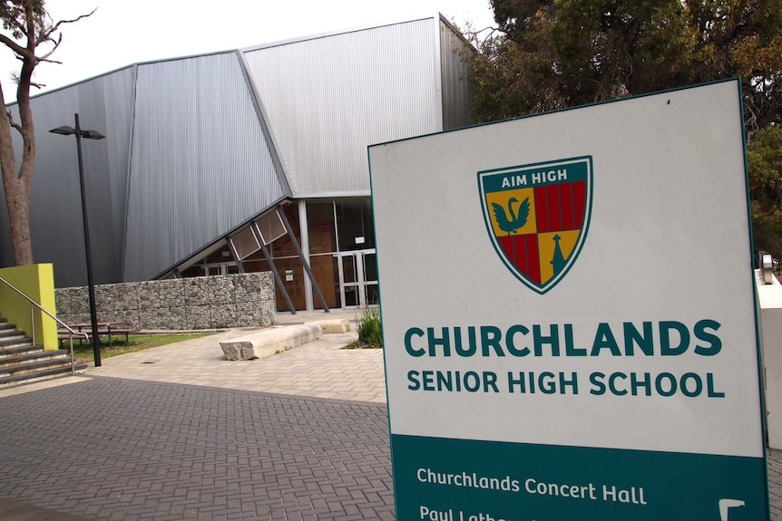 A sign reading Churchlands Senior High School on the edge of the school site.