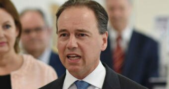 Greg Hunt speaking at a press conference.