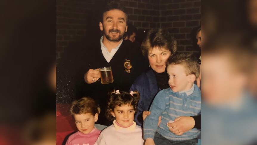 Two girls and a boy with a mother