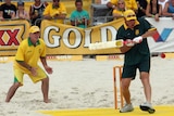 Allan Border (left) and Shaun Pollock taking part in a beach cricket competition
