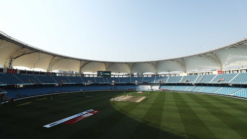 Wide shot of a cricket stadium.