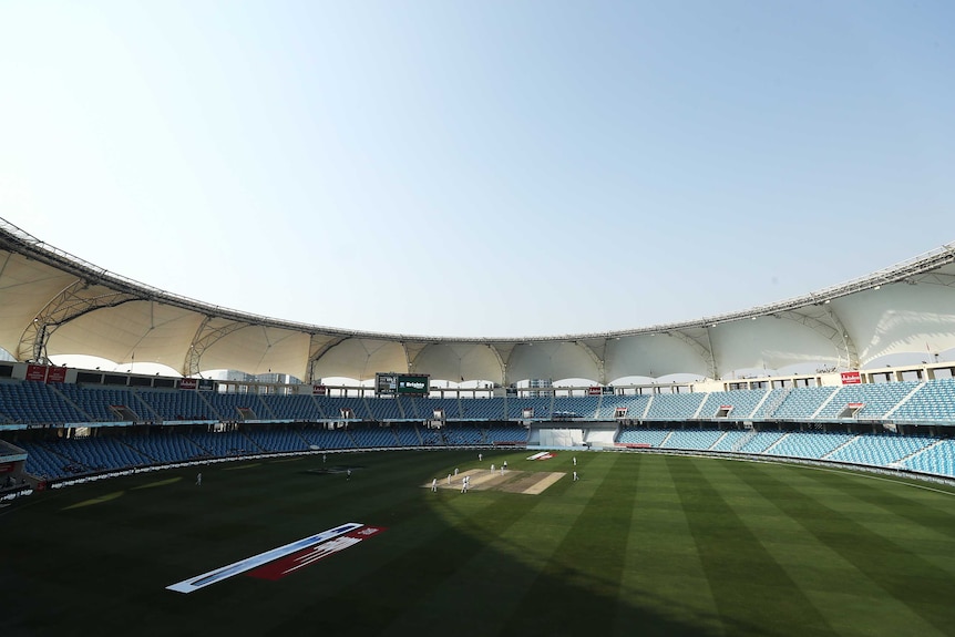 Wide shot of a cricket stadium.