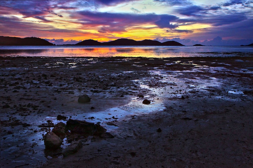 Sunset over a beach.