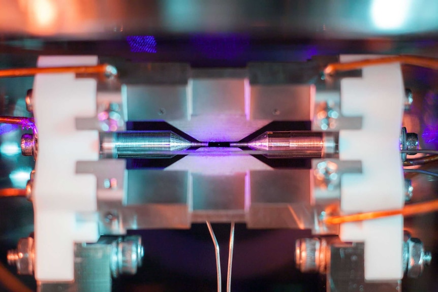 A photo taken of a single positively-charged strontium atom, held near motionless by electric fields.