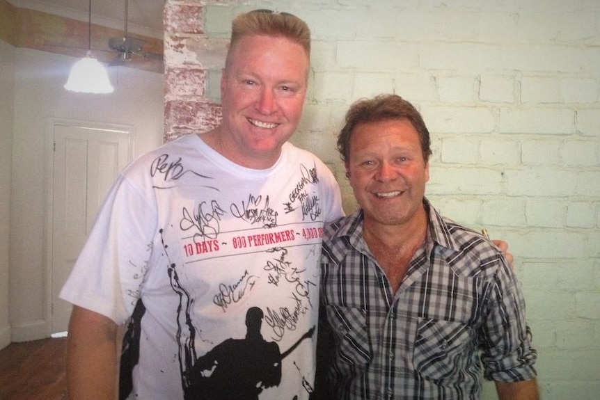 Ray Beaman and Troy Cassar-Daley pose for a photograph side by side