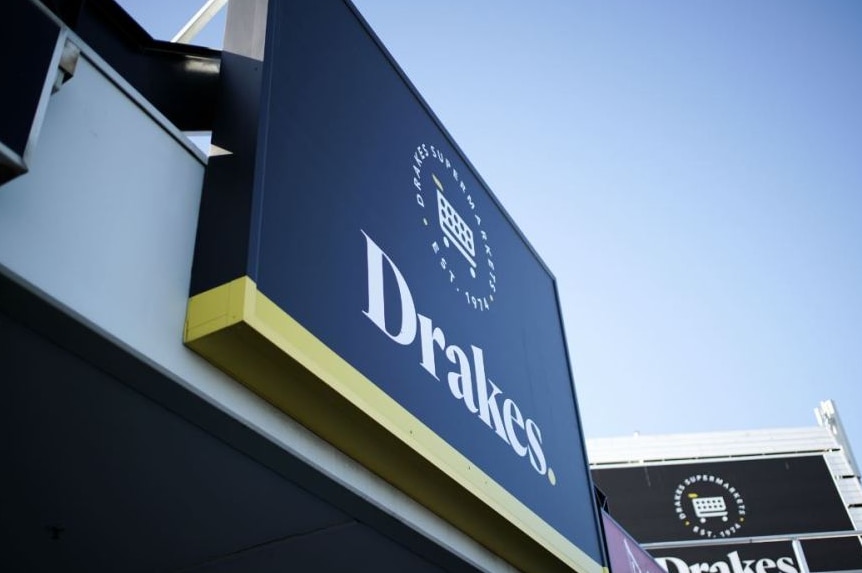 A Drakes Supermarket sign.