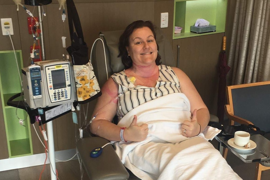 Sarah Chaundy gives the thumbs up in hospital