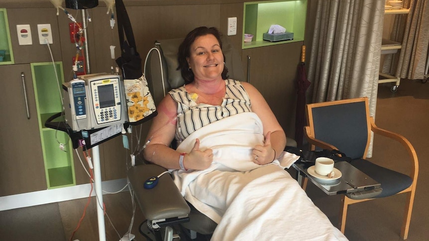 Sarah Chaundy gives the thumbs up in hospital