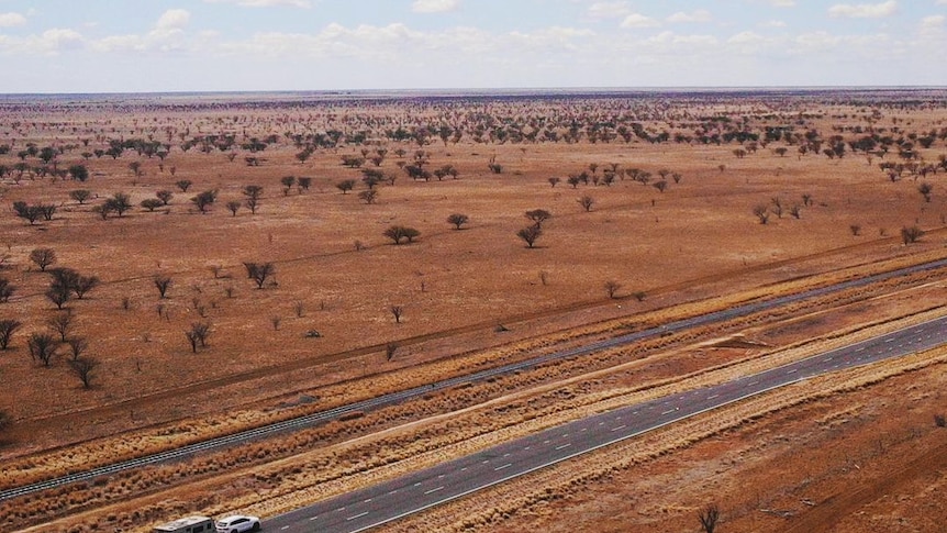 An aerial shot of an outback road