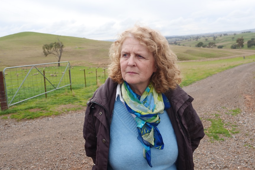 A close up of a woman looking concerned. 