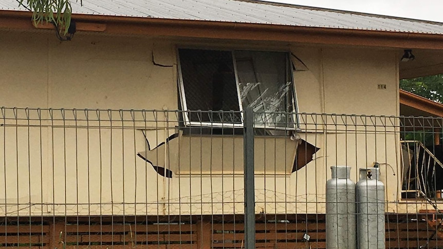 A windows and a fibro wall blown out in the side of a house