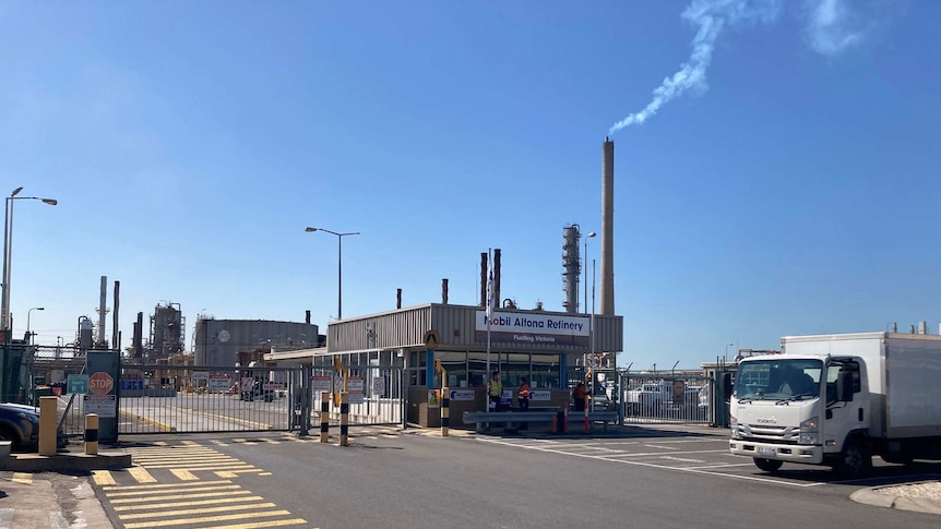 A suburban oil refinery on a sunny day.