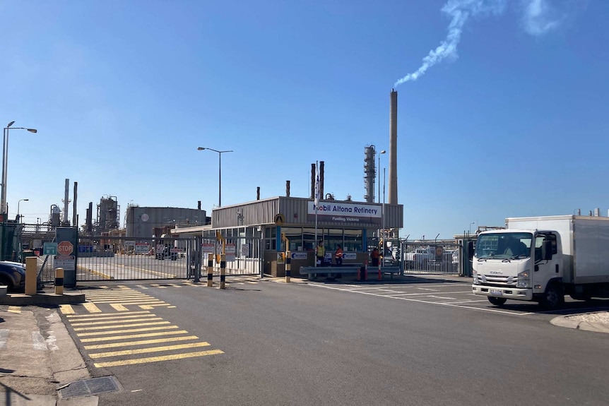 A suburban oil refinery on a sunny day.