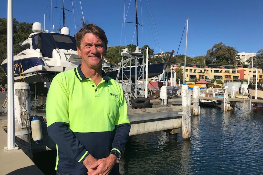 A man stands at Berrys Bay.