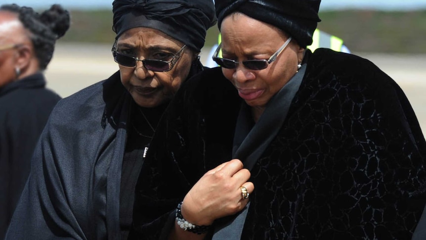 The ex-wife of Nelson Mandela, Winnie Mandela Madikizela (L), and his widow Graca Machel.