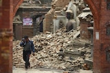 A man cries amid the rubble of Kathmandu