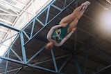 Trampolinist Eva Keirath performs a somersault during training.