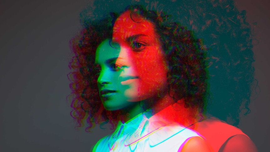 green and red multi exposure image of young woman with dark curly hair